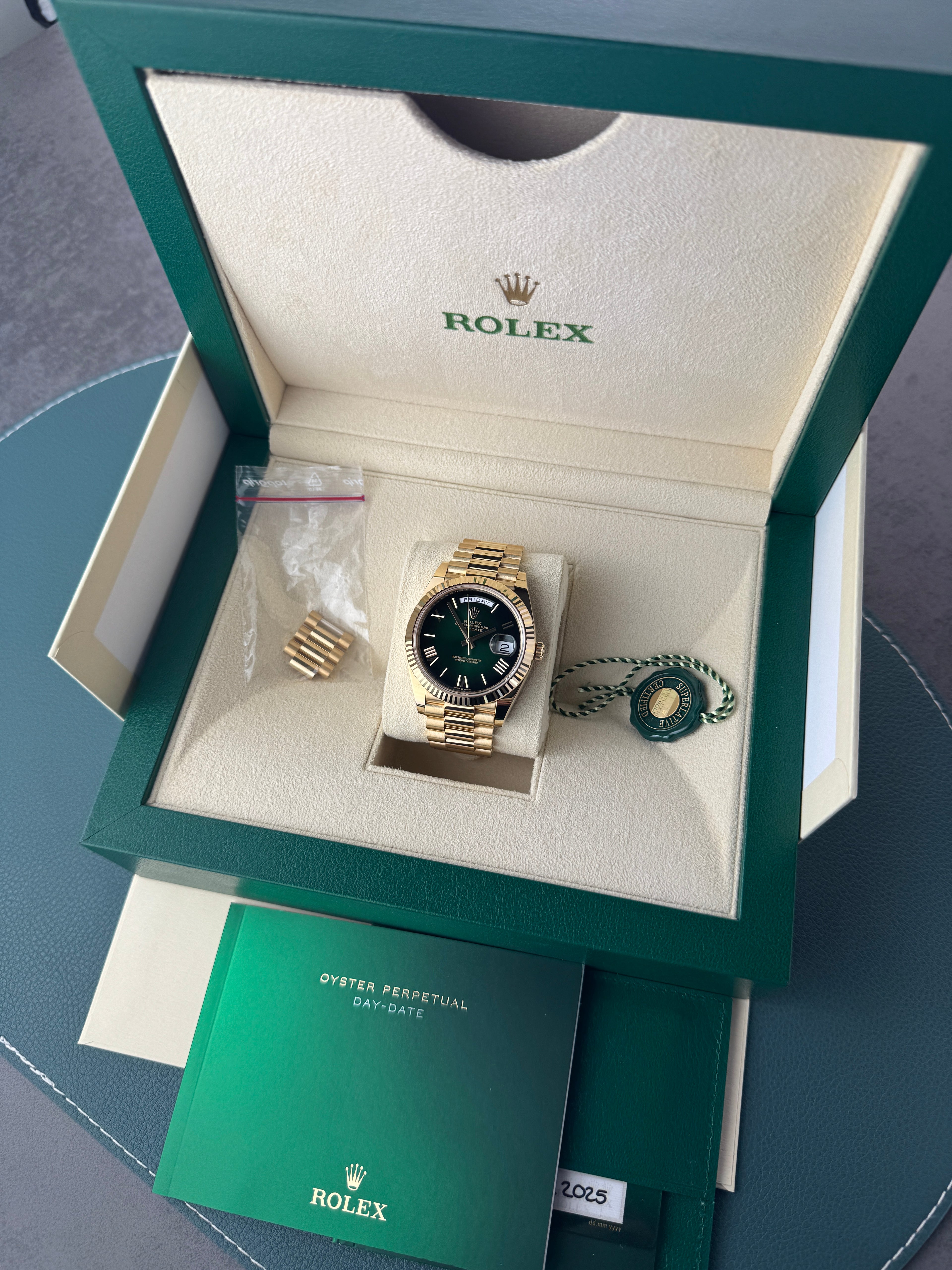 Rolex Day Date 40 Gelbgold Grün 228238