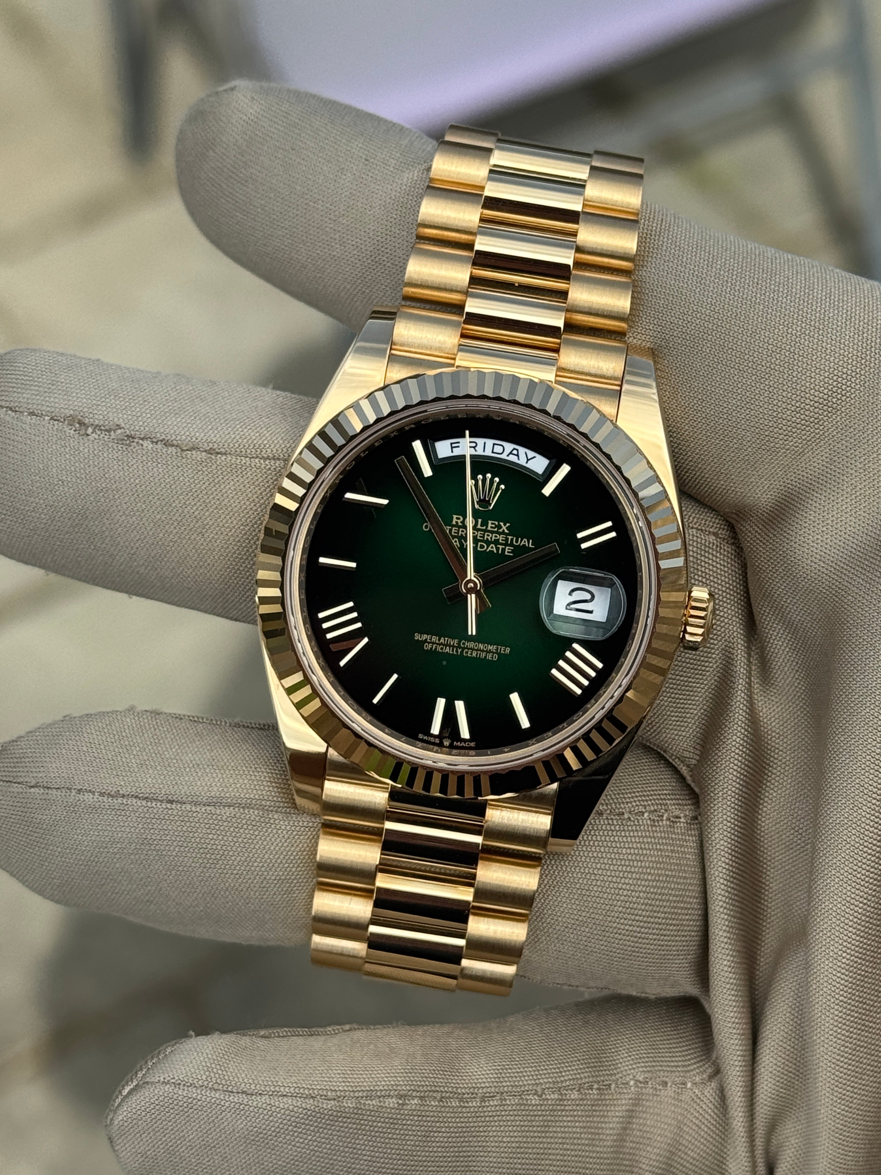 Rolex Day Date 40 Gelbgold Grün 228238